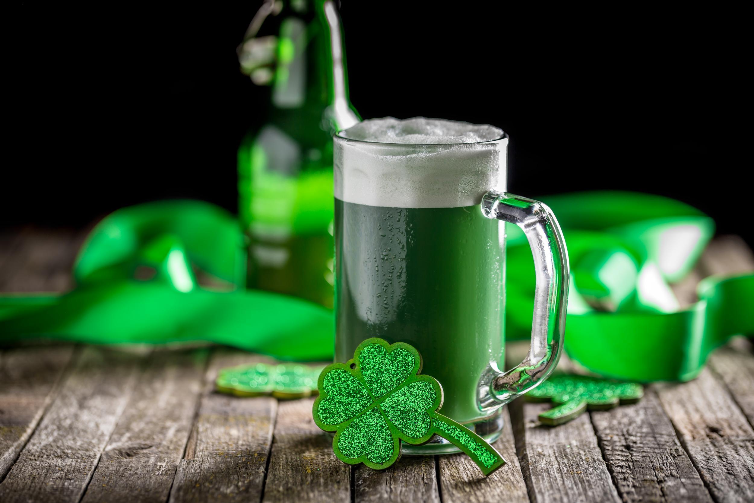 Green around the gill: people celebrate St Patrick’s Day with dyed beer