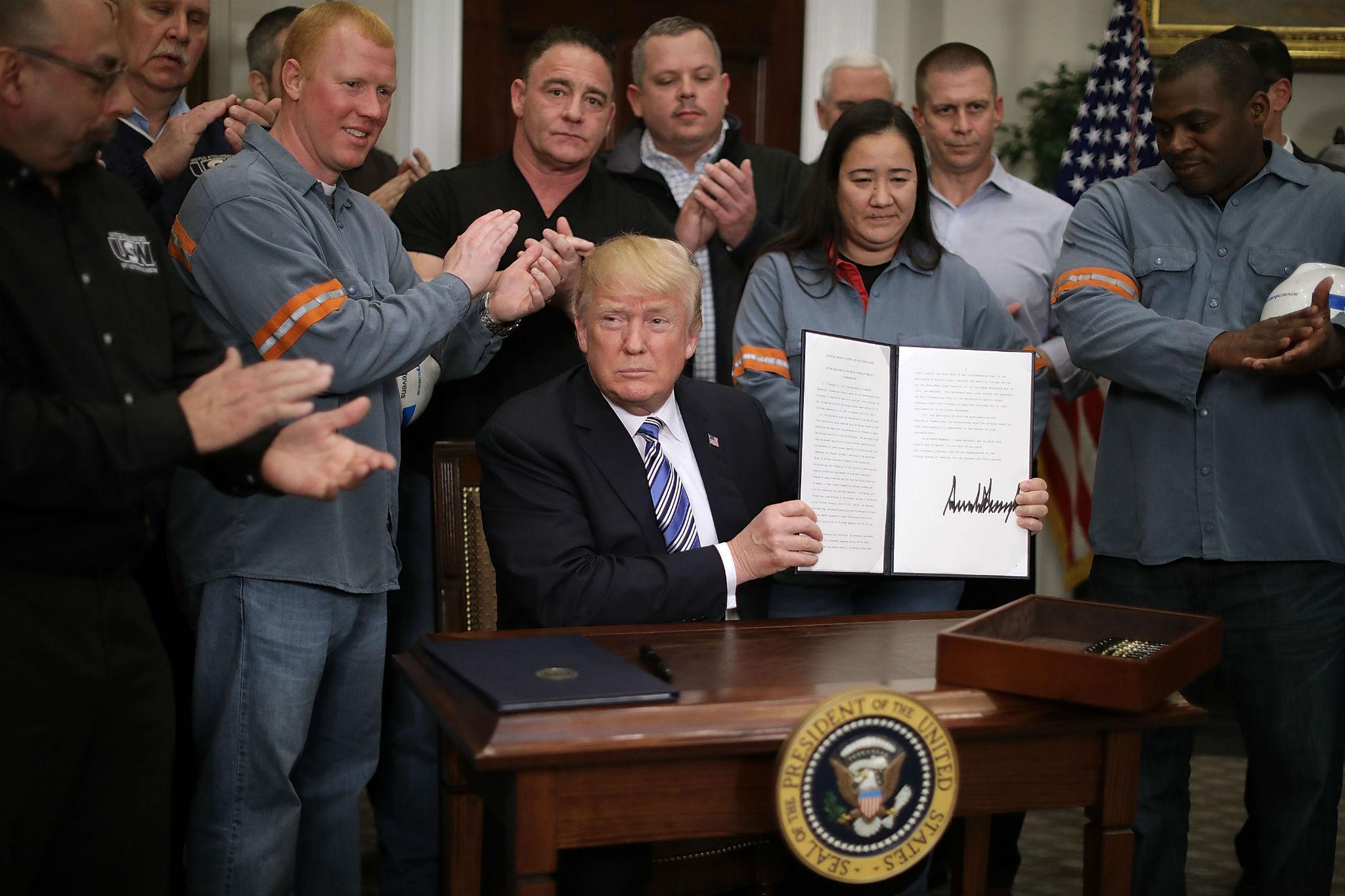 Surrounded by industry workers, Trump signs ‘Section 232 Proclamations’ on steel imports