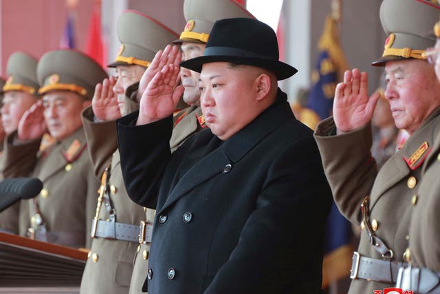 North Korean leader Kim Jong Un attends a grand military parade in Pyongyang