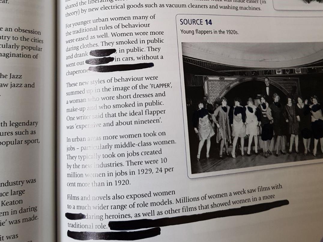 Pictures of women’s legs and and shoulders in the textbook have also been covered up (Humanists UK)