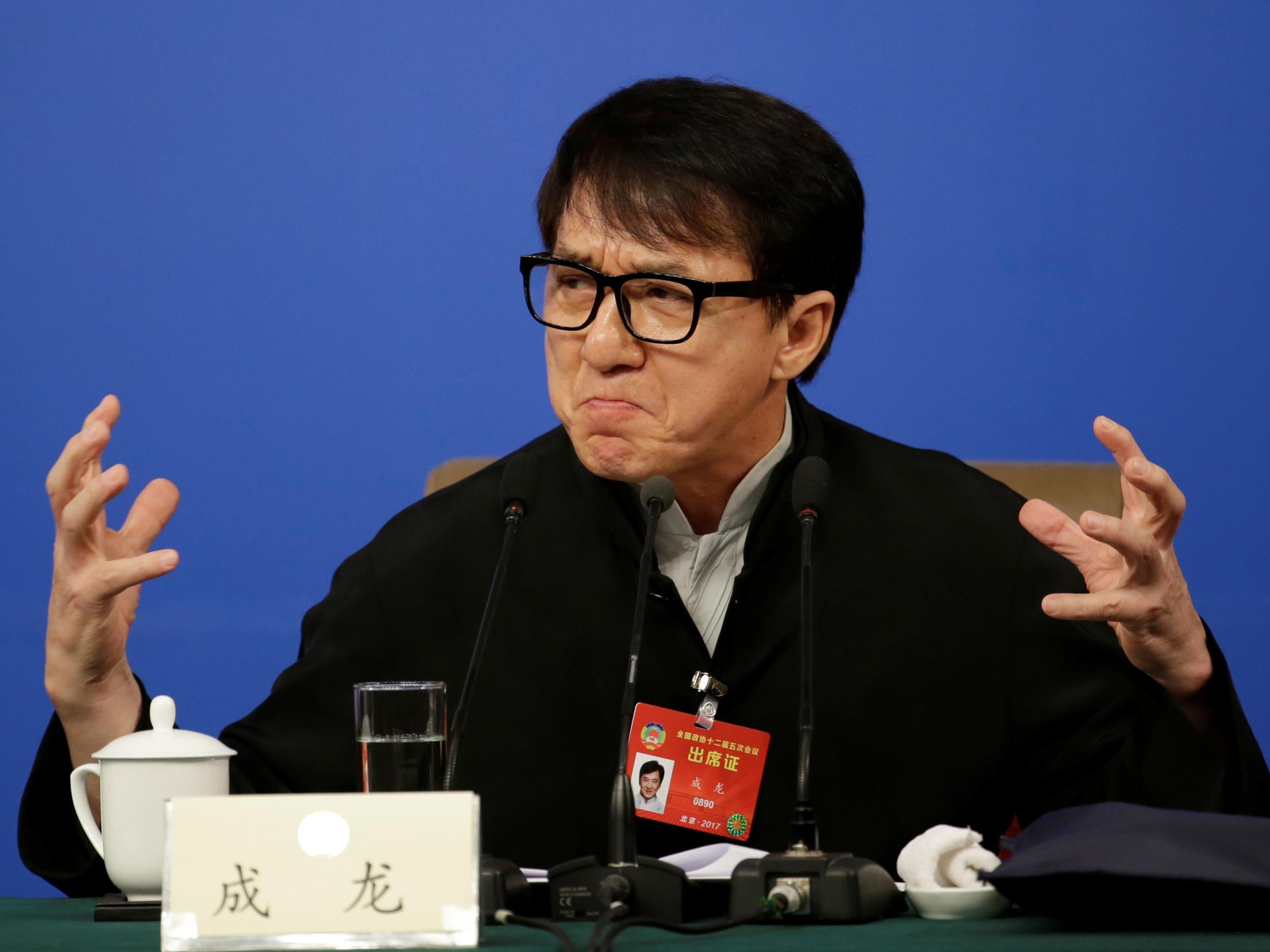 Jackie Chan attends a news conference during the National People's Congress in China this week