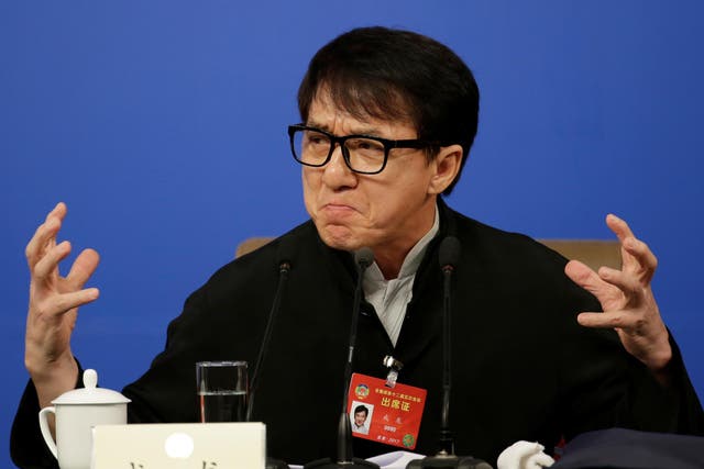 Jackie Chan attends a news conference during the National People's Congress in China this week