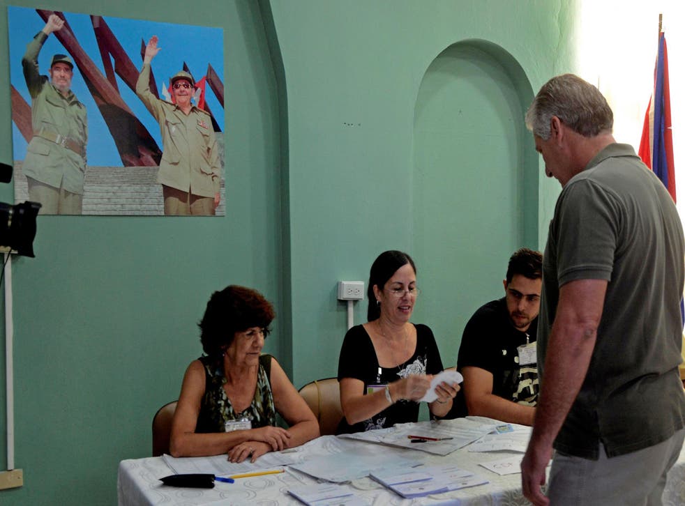 Cuban First Vice President Miguel Diaz-Canel prepares to cast his vote at a polling station in November's municipal elections