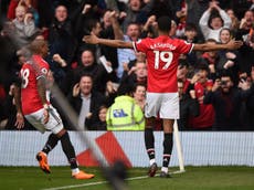 Rashford scores twice as United cling onto victory over Liverpool