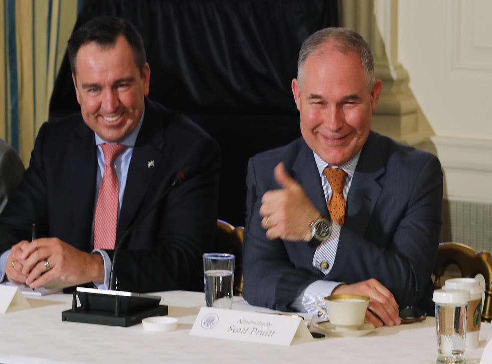 Environmental Protection Agency Administrator Scott Pruitt gives a thumbs-up during a meeting. The agency's scientific advisory committee has not met in six months.