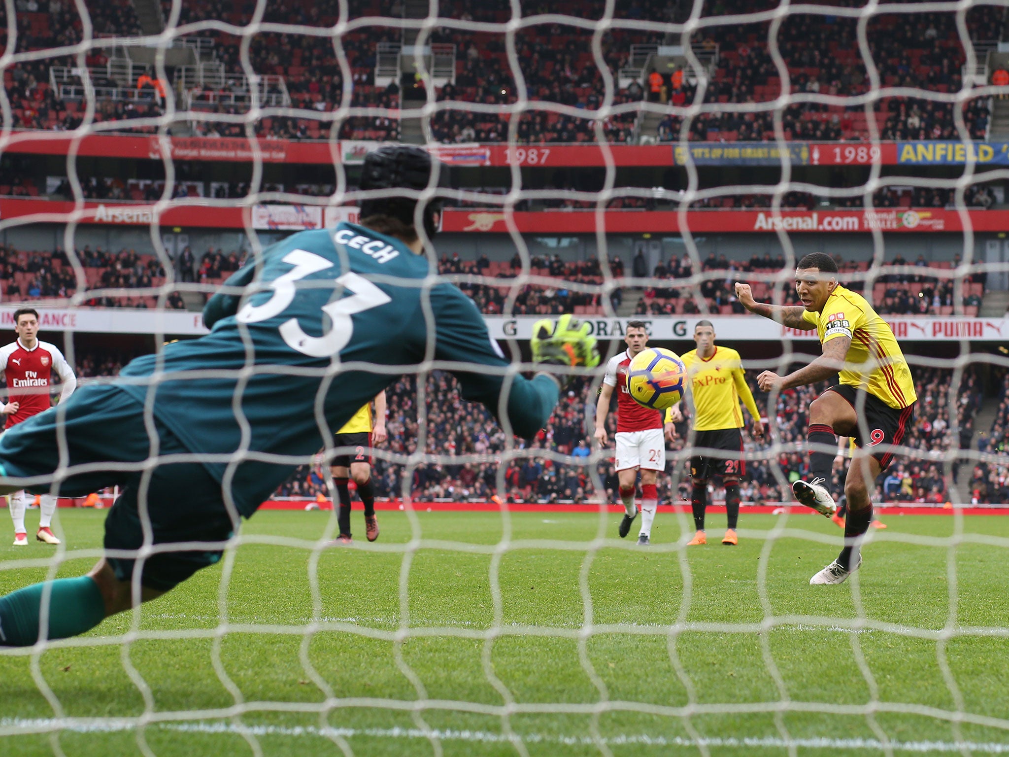 Petr Cech, seen here saving Troy Deeney's penalty, kept his 200th clean sheet - a Premier League record