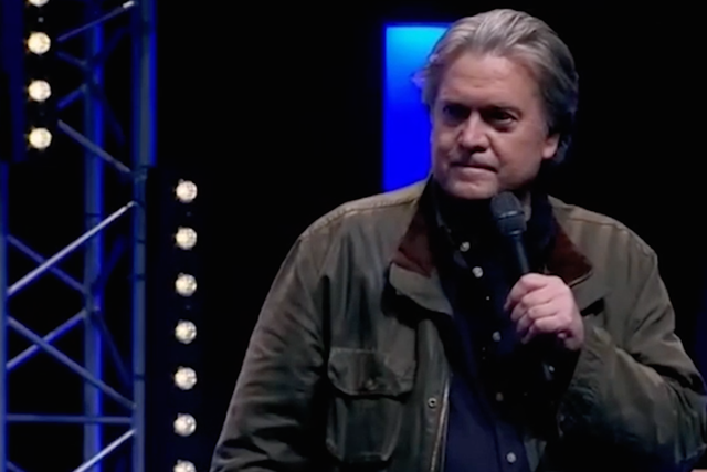 Steve Bannon addresses an audience at a National Front conference in Lille