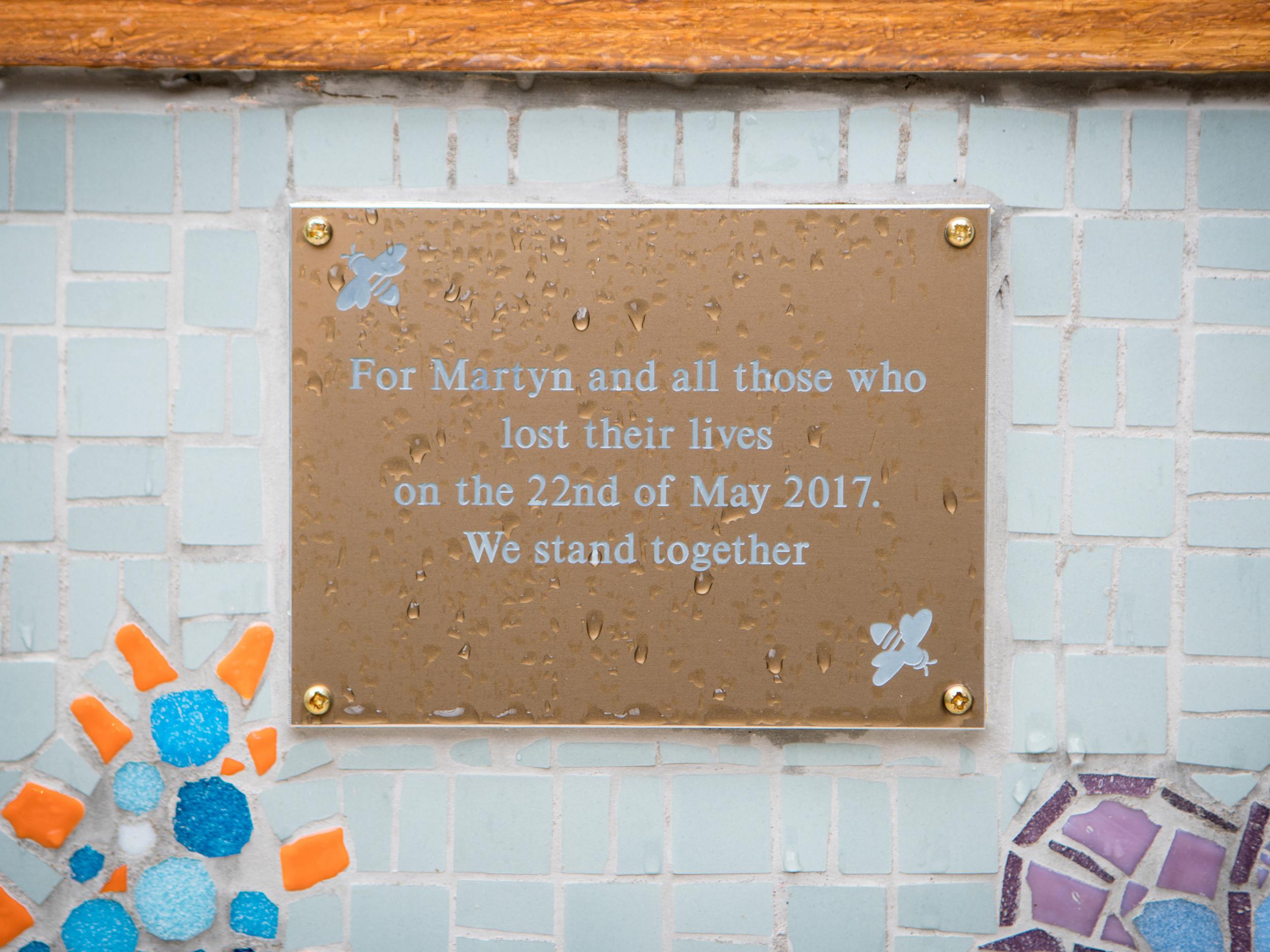 The plaque is affixed to a bench in a newly unveiled part of the 'Coronation Street' set