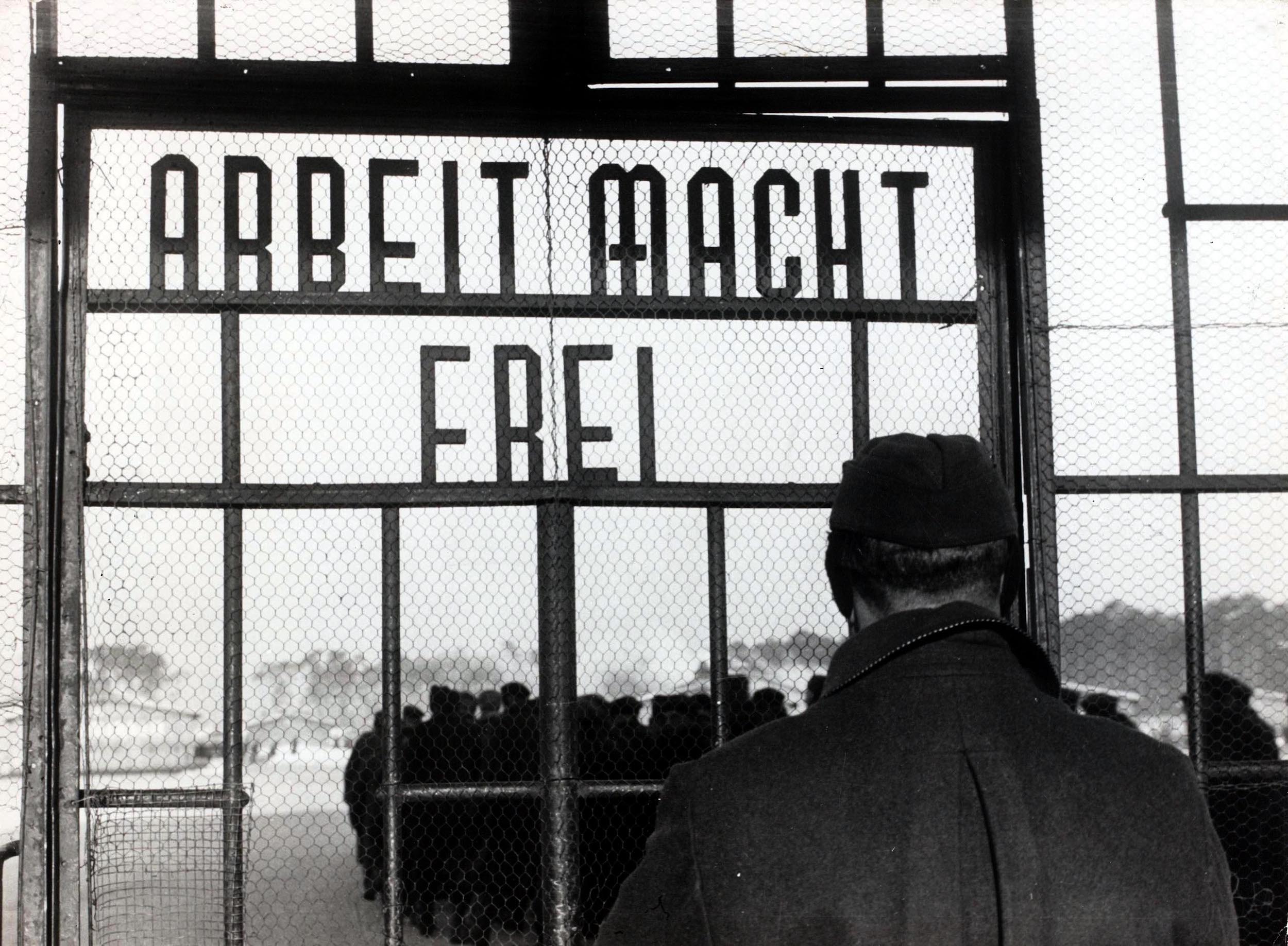 The sign (‘work sets you free’) is known for appearing on the entrance of Auschwitz and other concentration camps