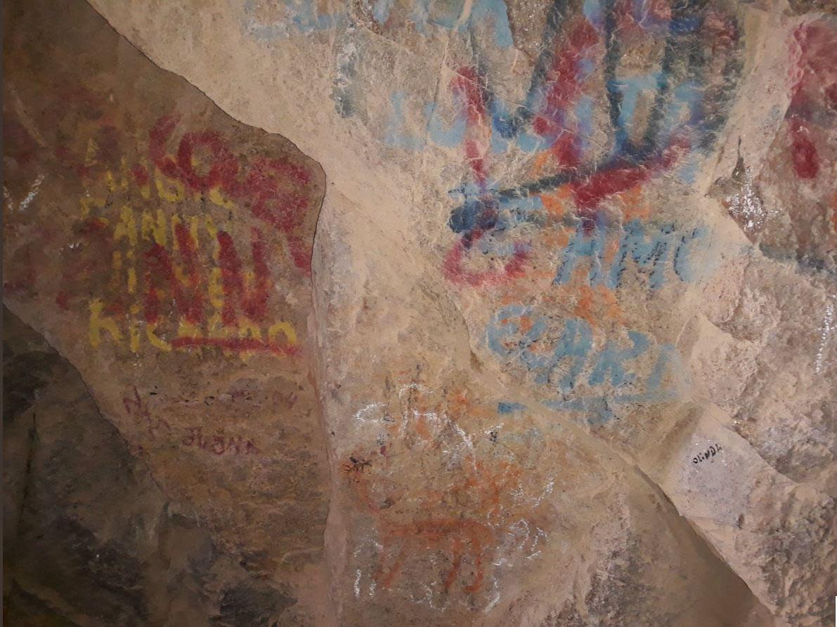 Vandals have obscured the ancient work, prompting a backlash against tourists