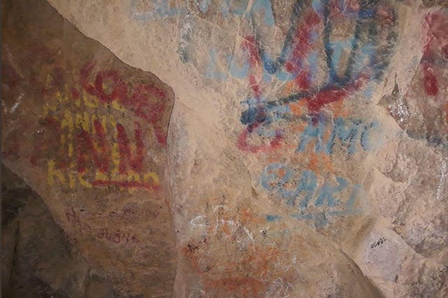 Vandals have obscured the ancient work, prompting a backlash against tourists