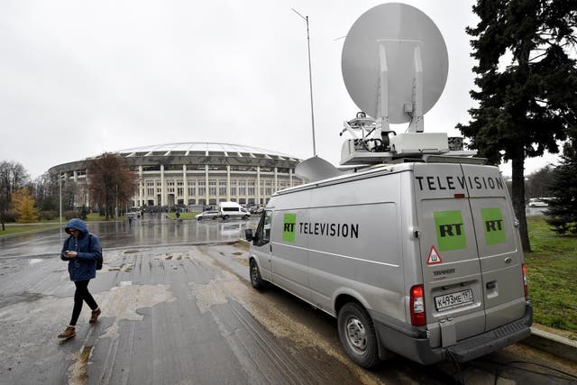 A Russia's state-controlled Russia Today (RT) television broadcast van is seen parked outside the Luzhniki stadium ahead of an international friendly football match between Russia and Argentina in Moscow on November 11, 2017