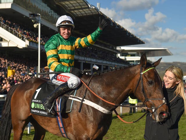 Barry Geraghty celebrates after winning The UniBet Champion Hurdle Challenge Trophy on Buveur D'air
