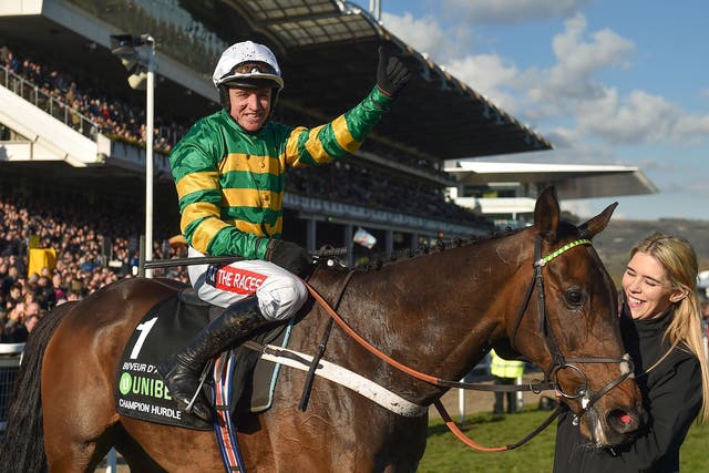 Barry Geraghty celebrates after winning The UniBet Champion Hurdle Challenge Trophy on Buveur D'air