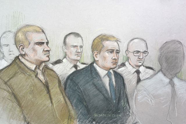 Mikko Vehvilainen and Mark Barrett (centre) on trial at Birmingham Crown Court where they are  accused of being part of the proscribed organisation National Action.