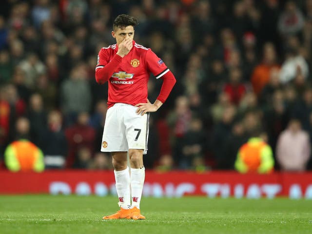 Alexis Sanchez looks on after the final whistle