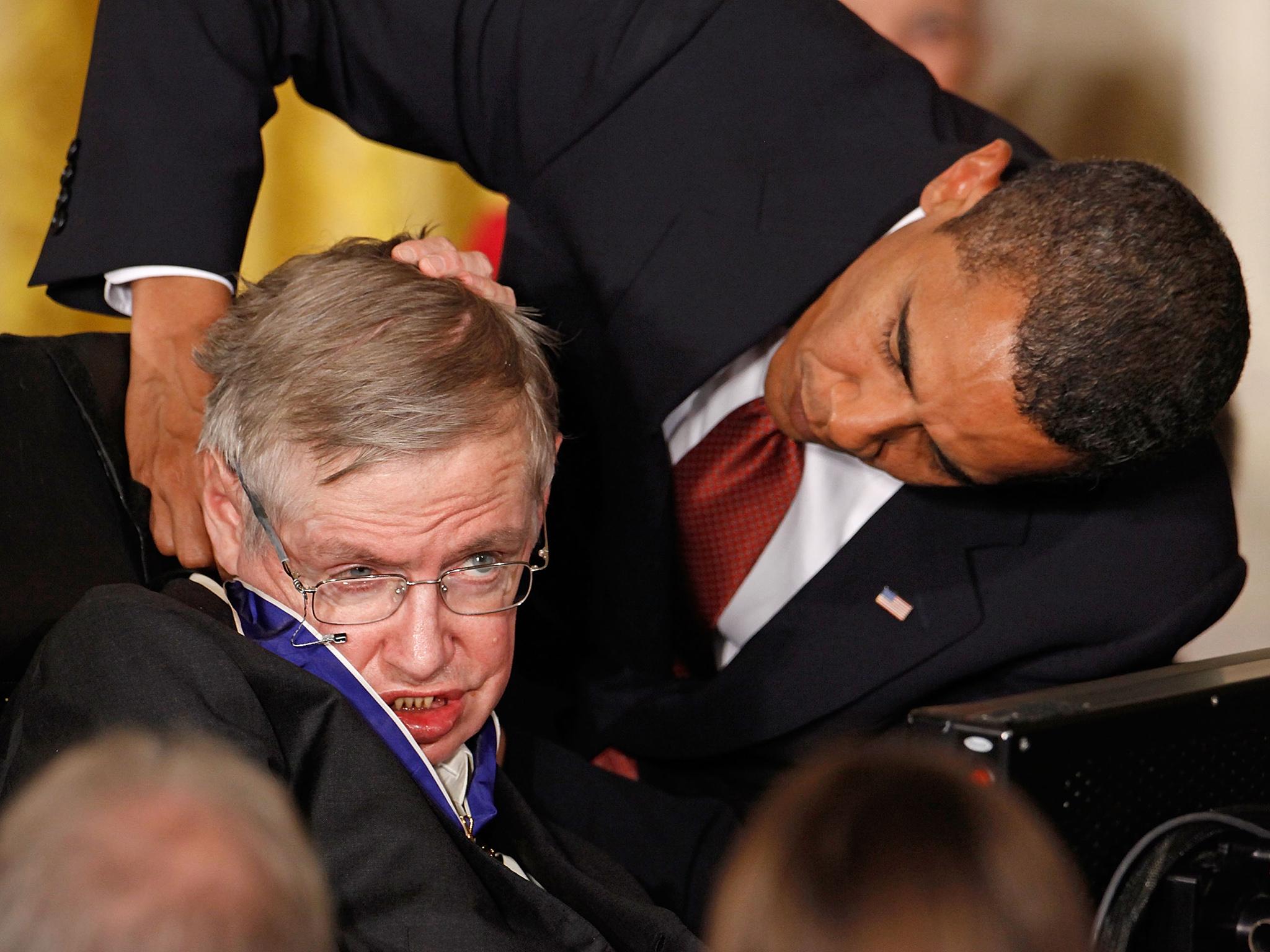 Hawking receiving the Presidential Medal of Freedom from former US President Barack Obama