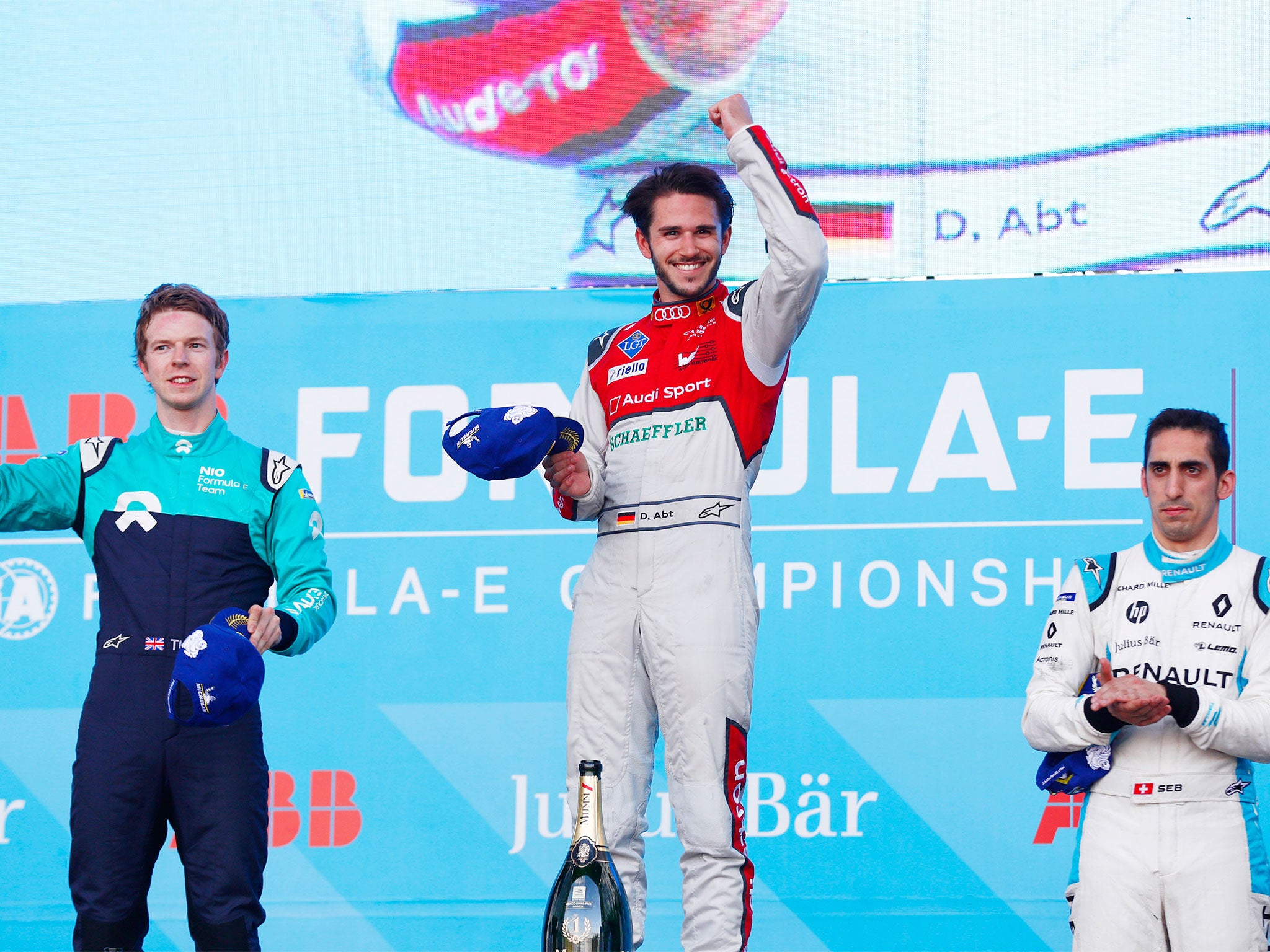 Oliver Turvey (l) came second behind Daniel Abt (c)