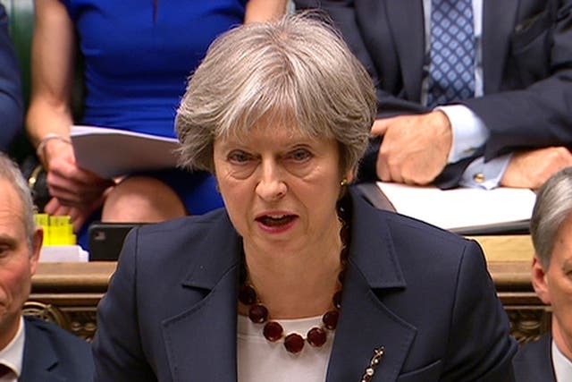 Britain's Prime Minister Theresa May addresses the House of Commons on her government's reaction to the poisoning of former Russian intelligence officer Sergei Skripal and his daughter Yulia in Salisbury