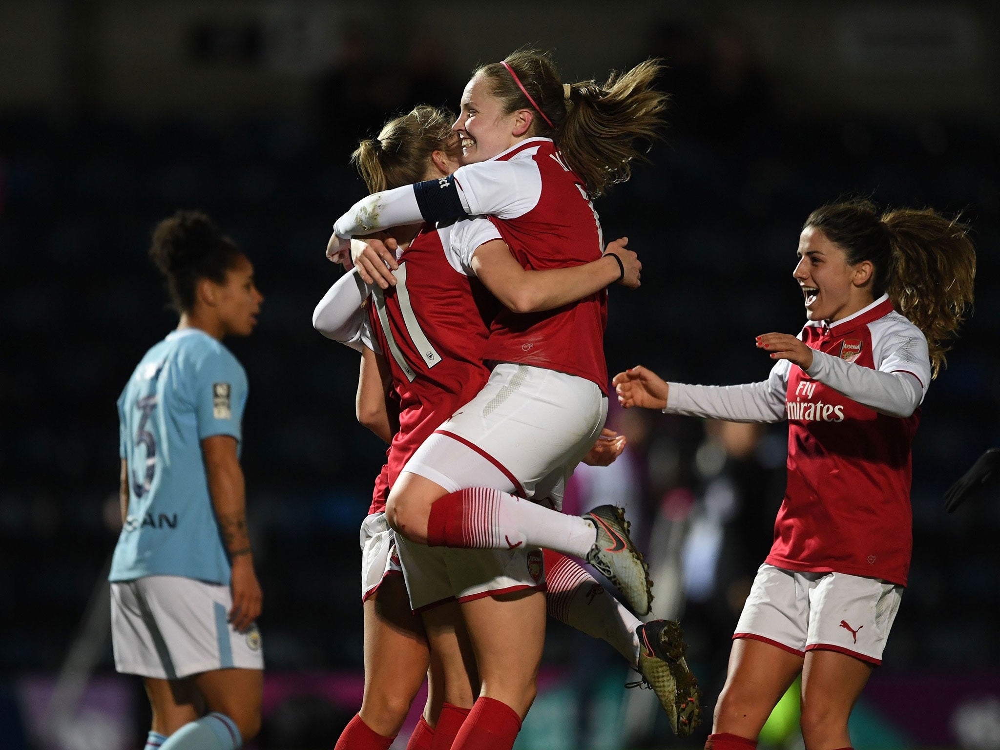 Arsenal's players celebrate after Vivianne Miedema put the side in front