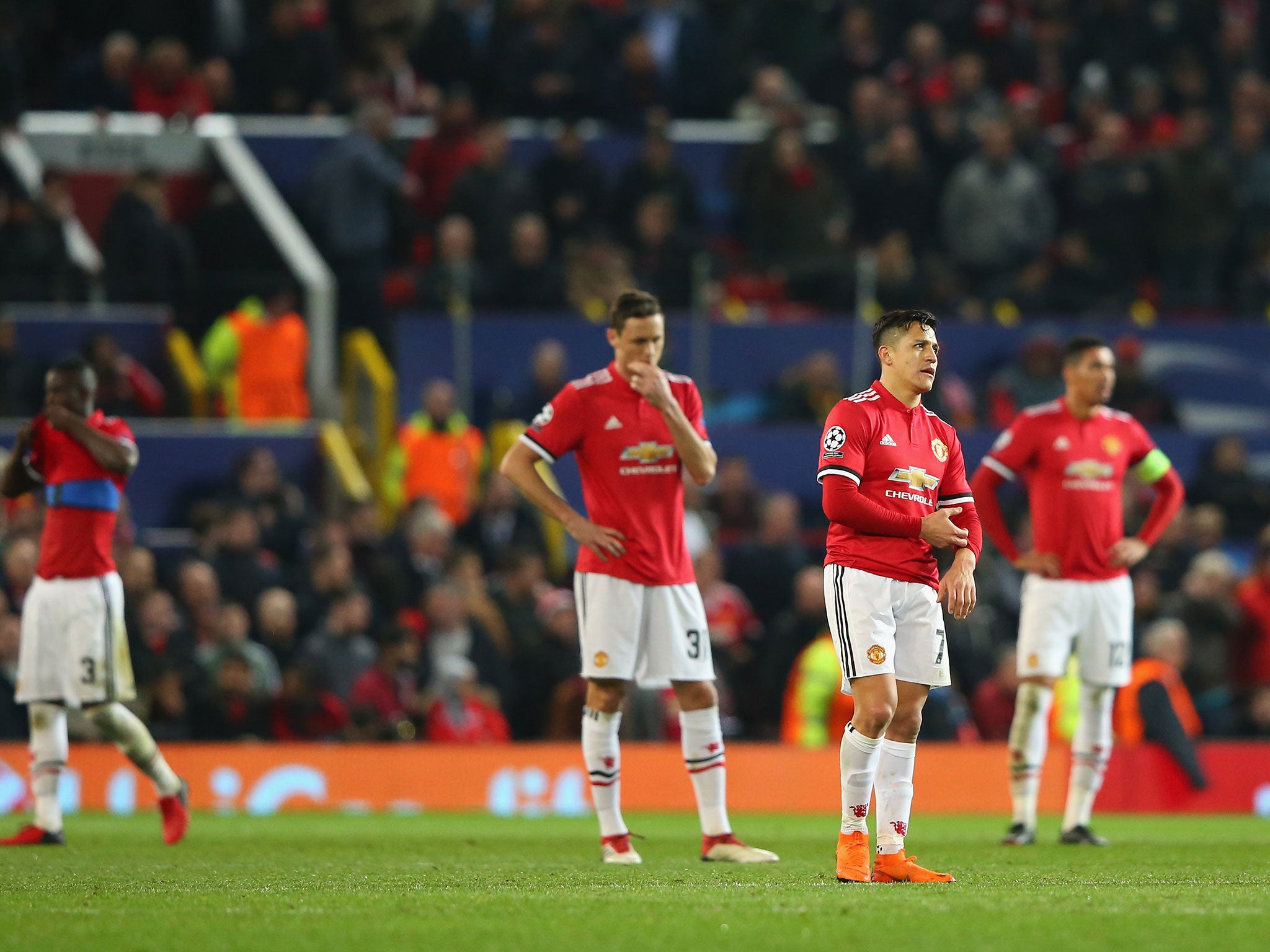 United's players react after their surprise defeat at Old Trafford