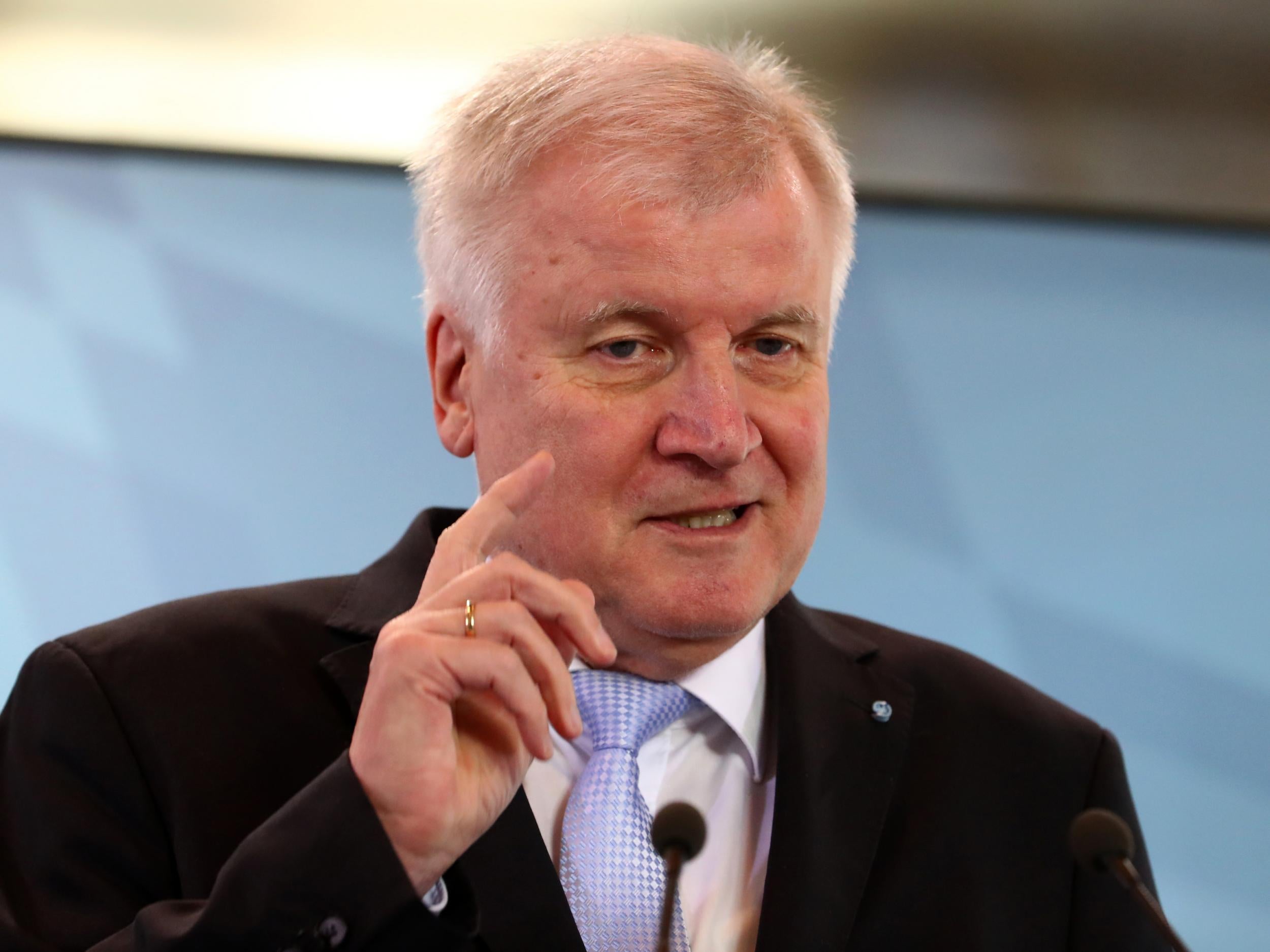 Seehofer made the comments as Merkel’s new coalition combats a rising challenge from the far right
