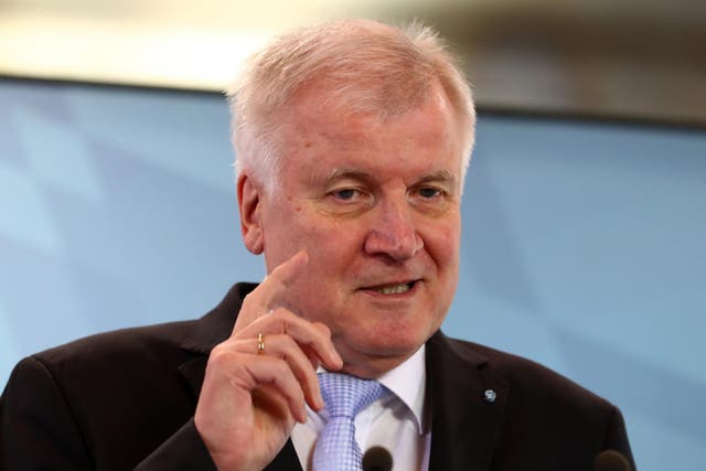 Seehofer made the comments as Merkel’s new coalition combats a rising challenge from the far right