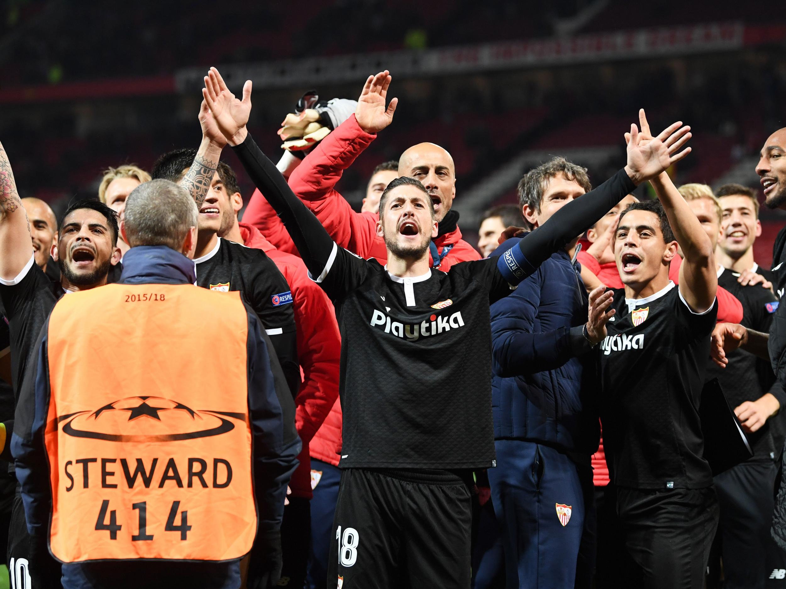 Sevilla's players celebrate their victory at Old Trafford on Tuesday