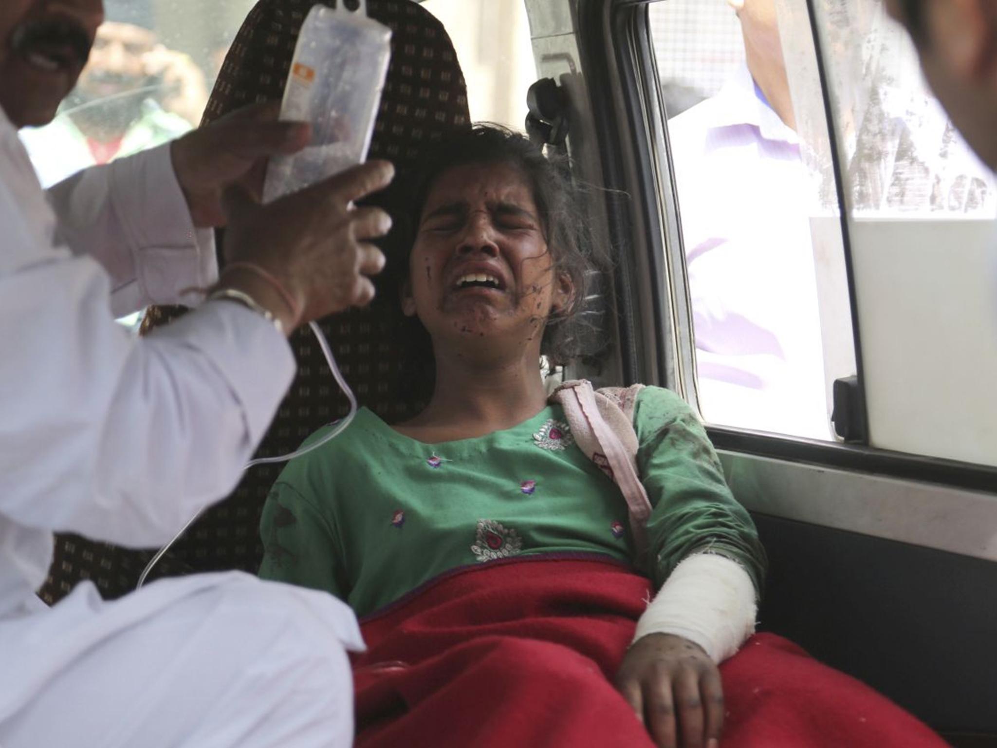 Fourteen-year-old Nooren Akhtar was wounded amid the fighting