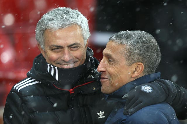 Chris Hughton defended the 'outstanding' Jose Mourinho after his difficult week