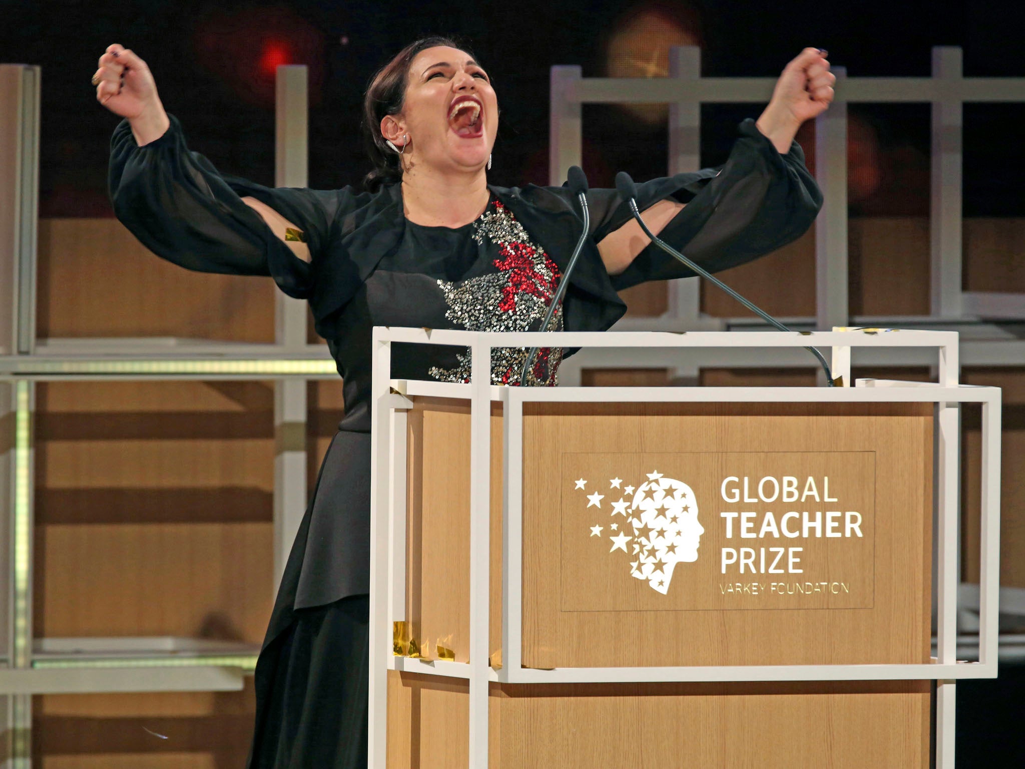 Andria Zafirakou reacts after winning the Global Teacher Prize