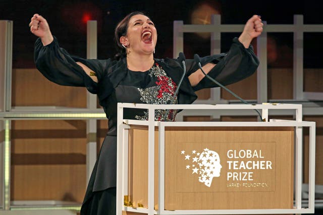 Andria Zafirakou reacts after winning the Global Teacher Prize