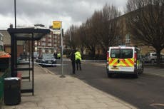 Man fighting for life after being shot by police in east London