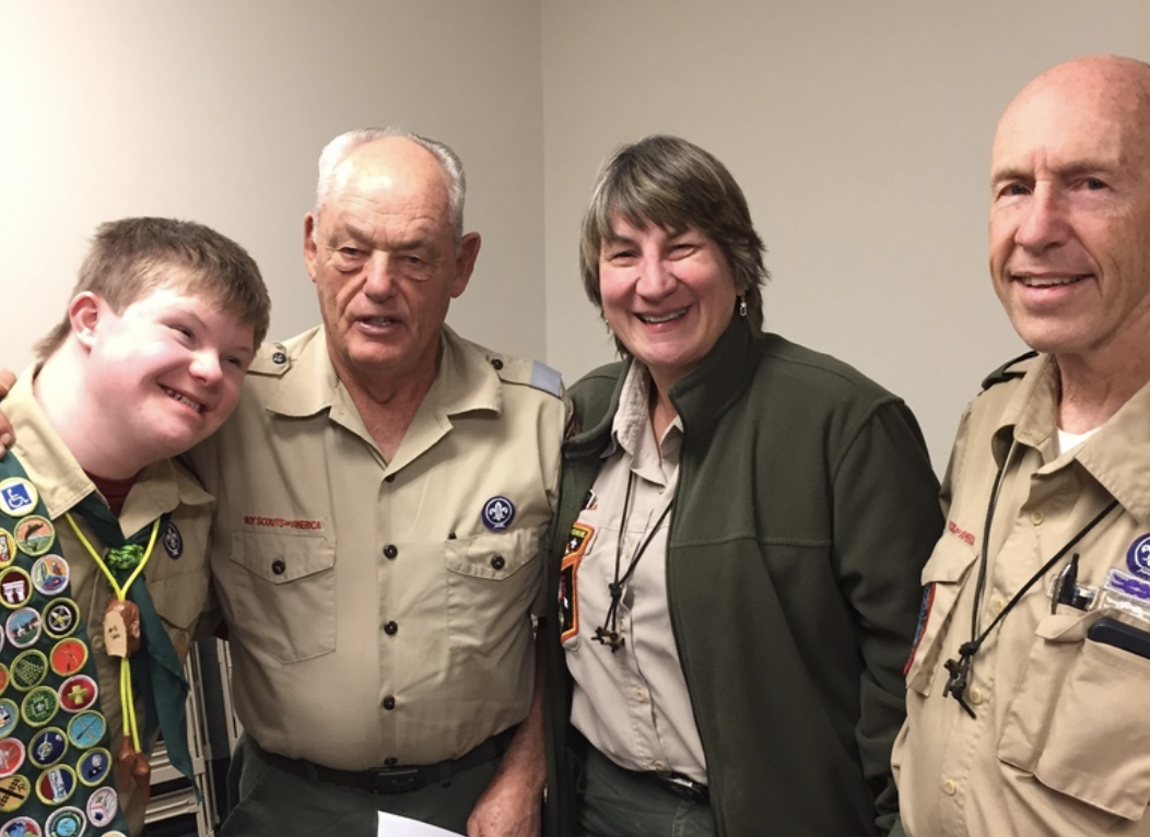 Logan with his Boy Scouts leaders (Chad Blythe)