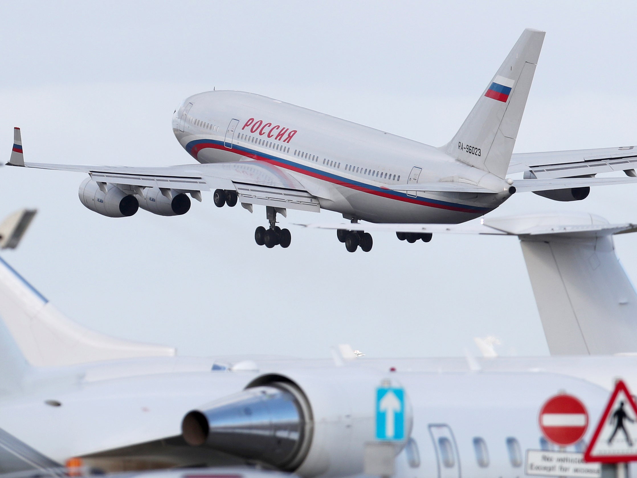 An aircraft sent to collect diplomats and their families from Russia's embassy in London takes off from Stansted aiport
