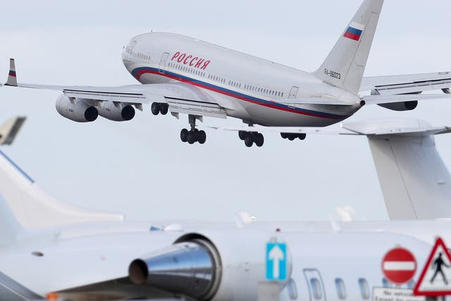 An aircraft sent to collect diplomats and their families from Russia's embassy in London takes off from Stansted aiport
