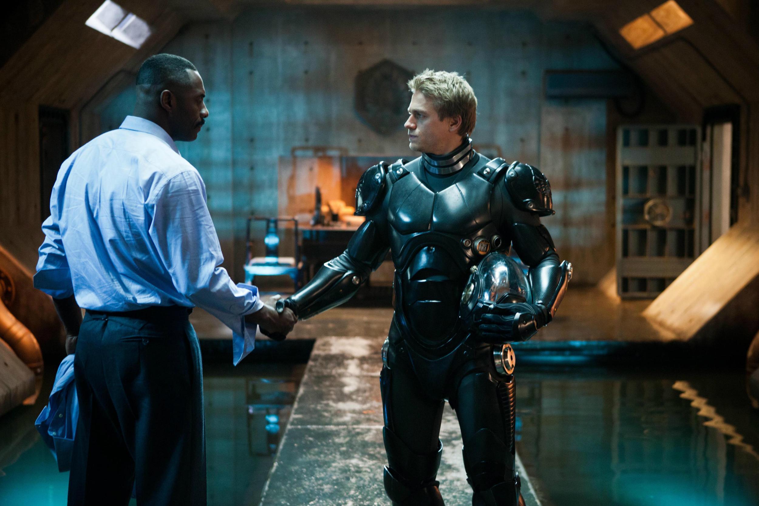 Idris Elba and Charlie Hunnam as General Stacker Pentecost and Raleigh Becket in the first film in the series