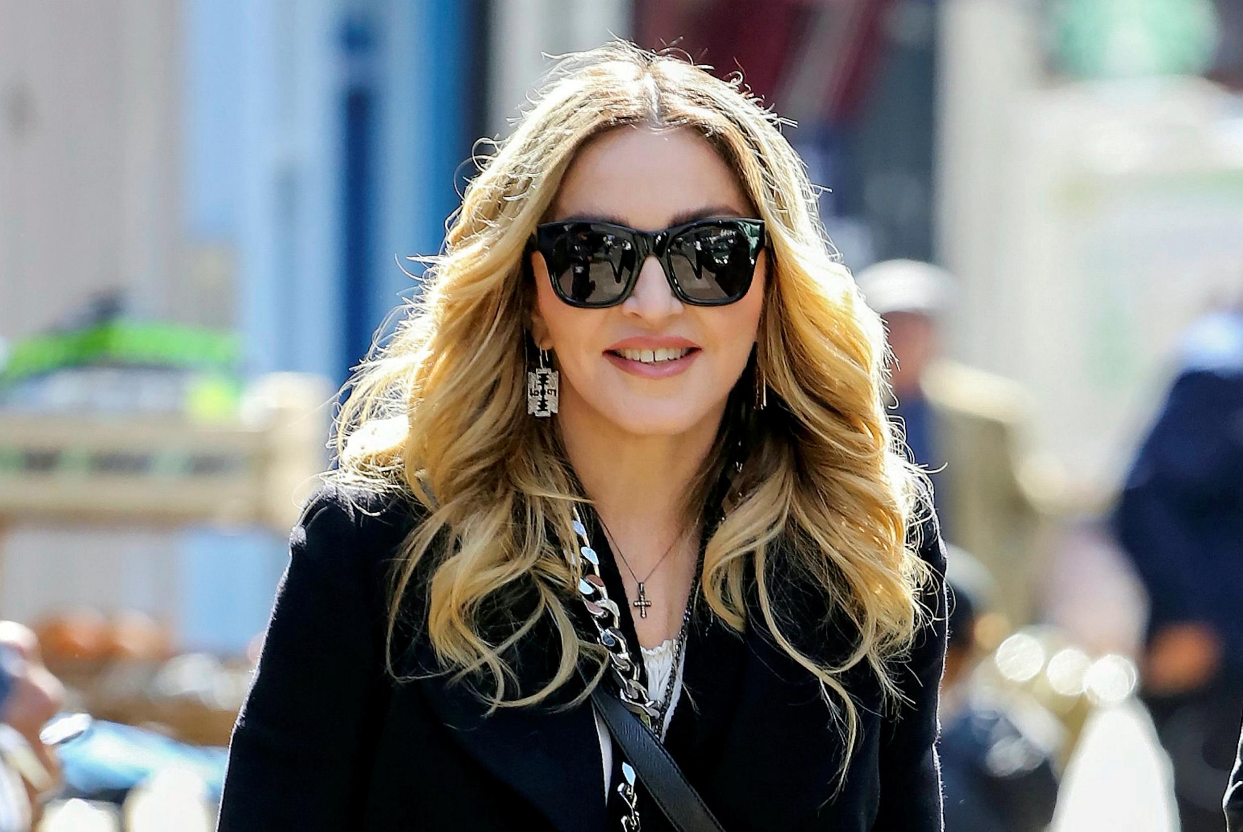 Madonna pictured wearing crucifix-inspired earrings