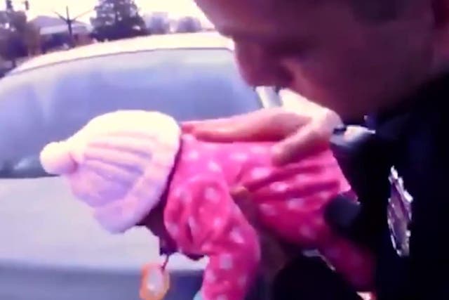 A police body camera filmed the officers saving the baby