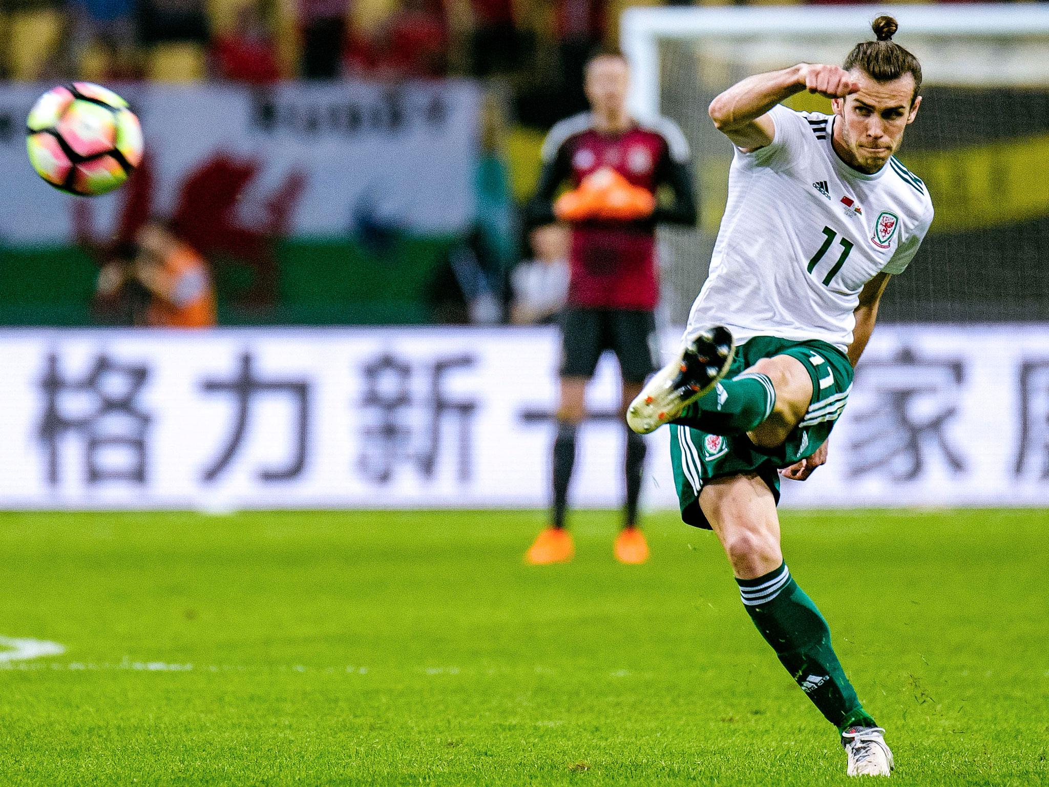 &#13;
Bale whips in a delivery into the Wales penalty box &#13;