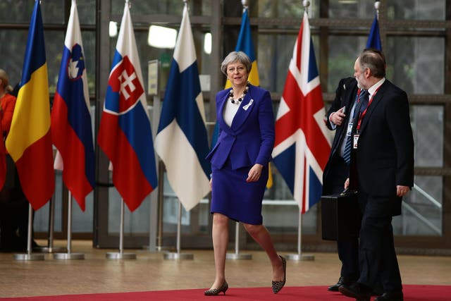 Theresa May arrives at the Brussels summit on Thursday