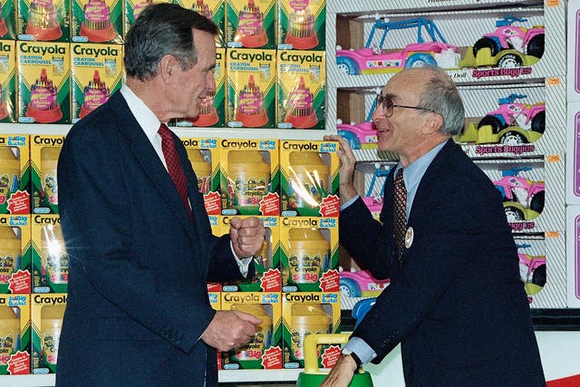 Charles Lazarus (right) with former US president George H W Bush