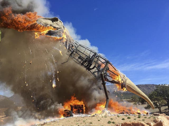 The robot dinosaur was engulfed in flames following an electrical malfunction