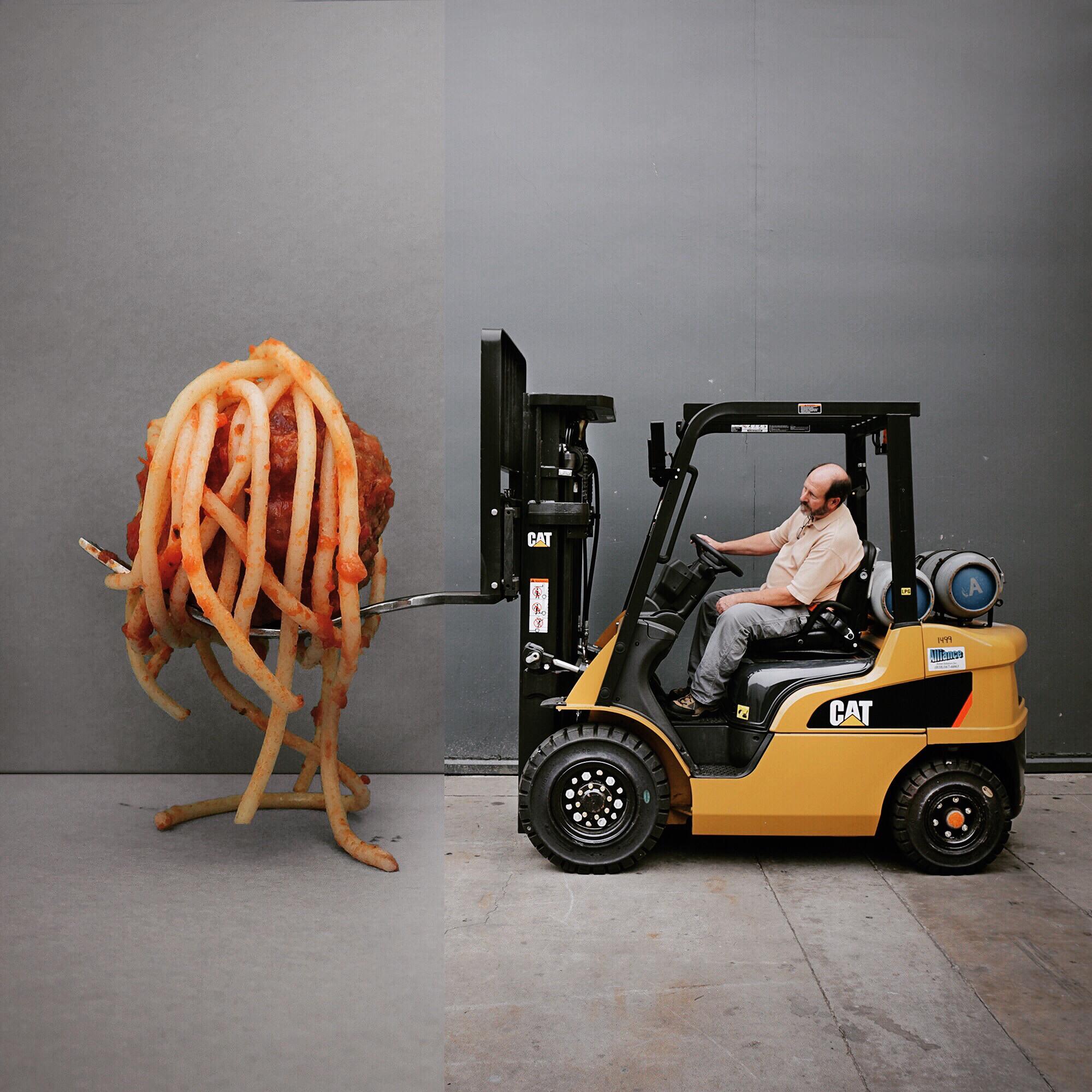 A spaghetti meatball being carried by a forklift