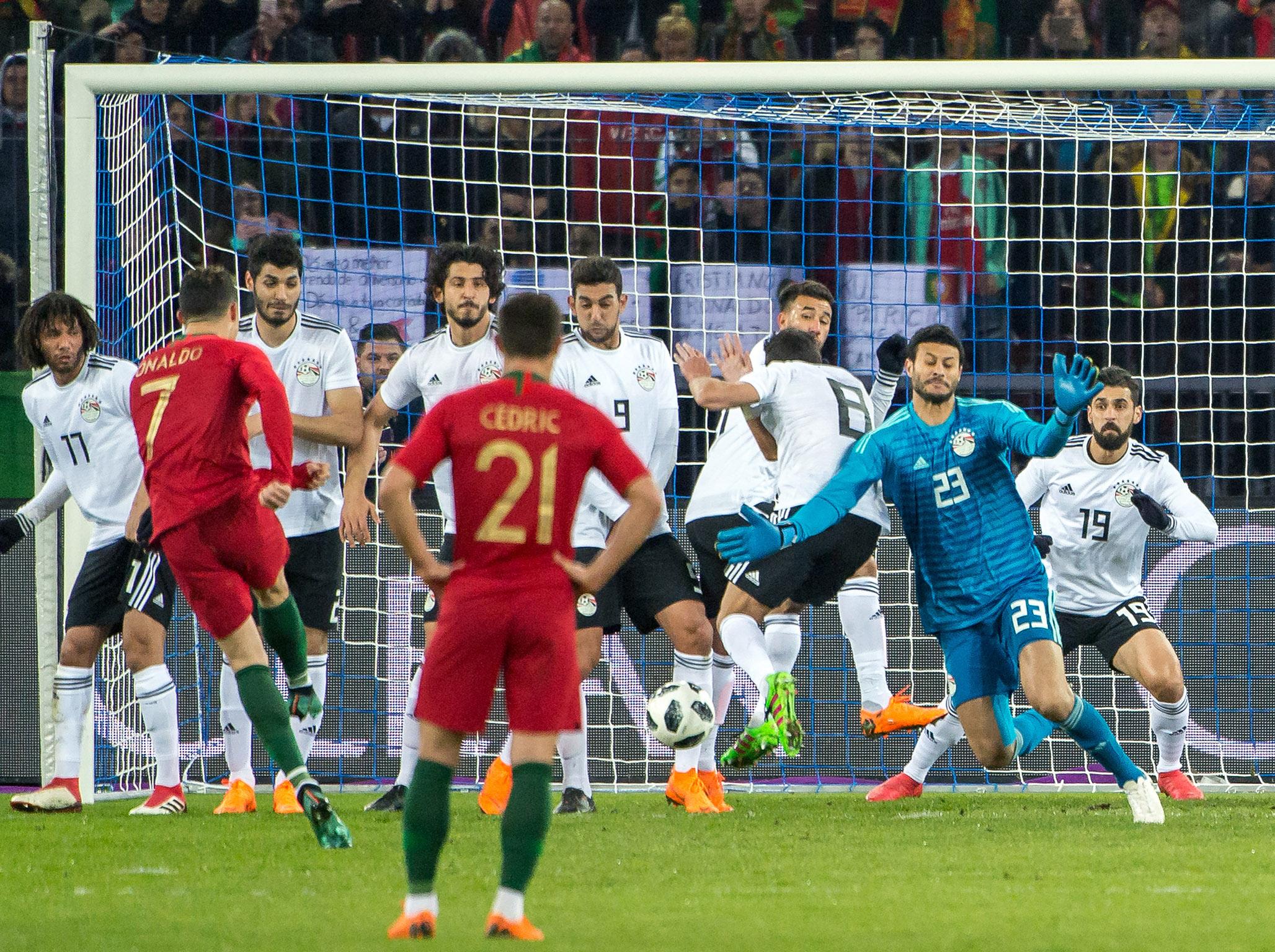 Cristiano Ronaldo strikes a free-kick at goal