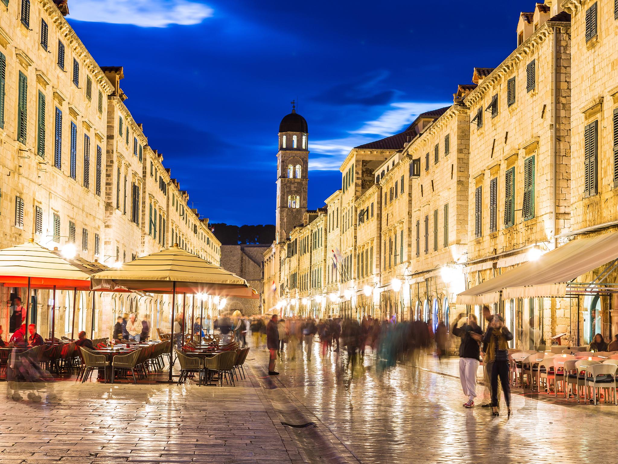 The busy city is known for its distinctive Old Town and stone walls