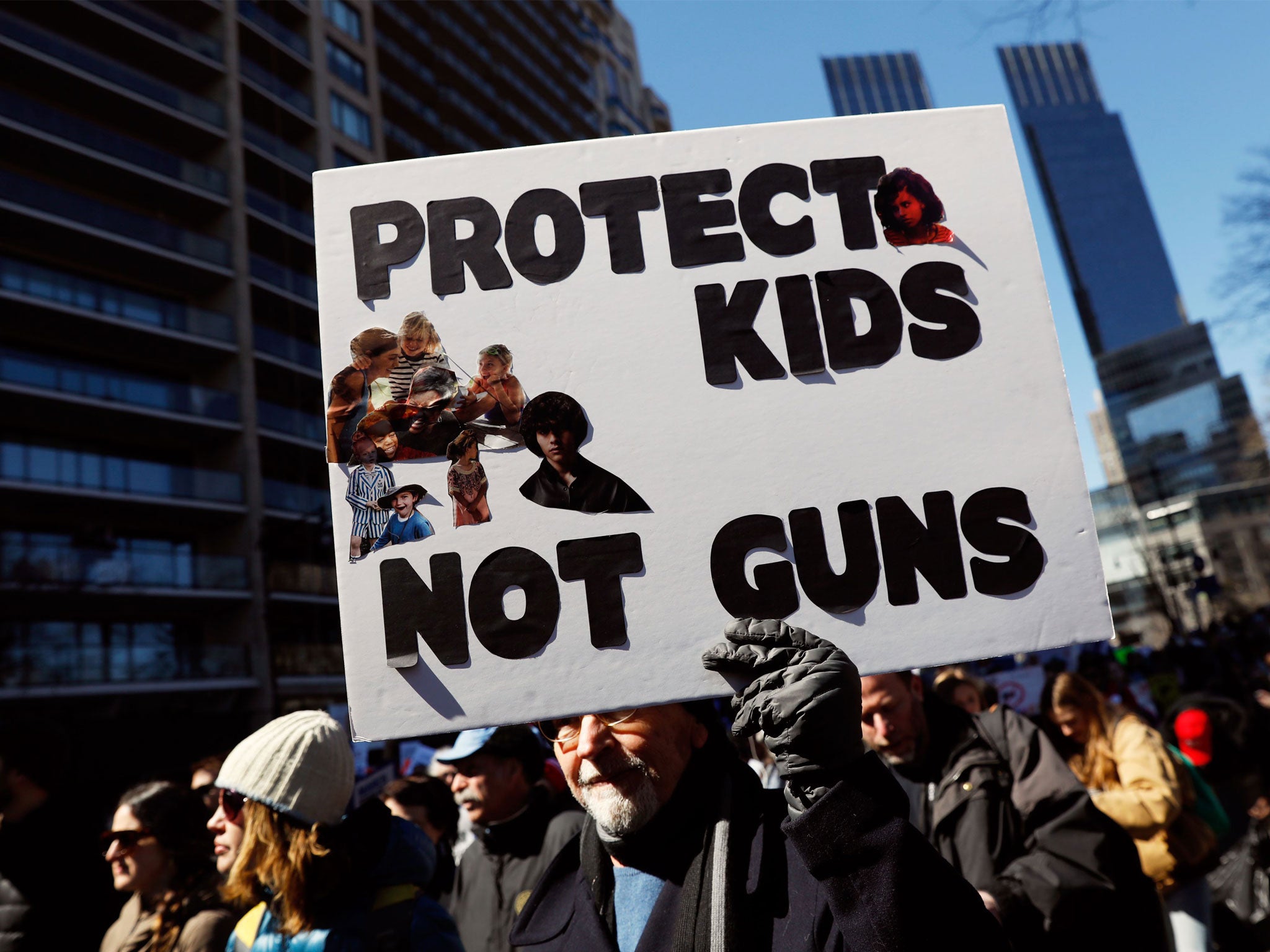 A protester holds a gun control sign during a 'March For Our Lives' demonstration demanding gun control in New York City