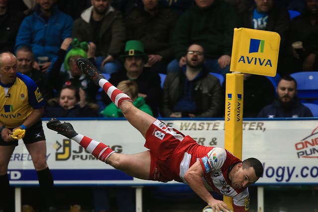 Tom Marshall dives for the line to score one of Gloucester's five tries against London Irish
