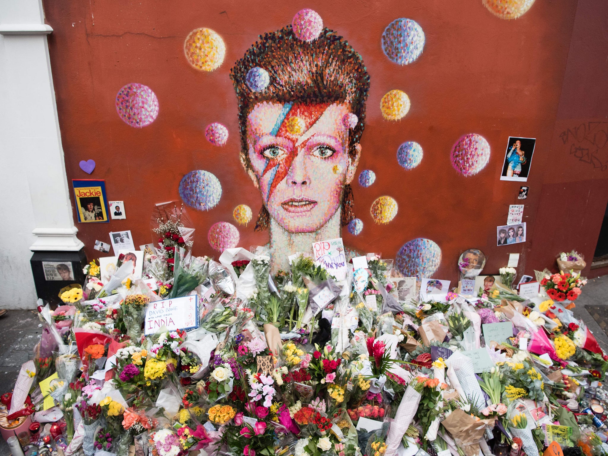 Starman: tributes at a Bowie mural in Brixton the day after the announcement of his death