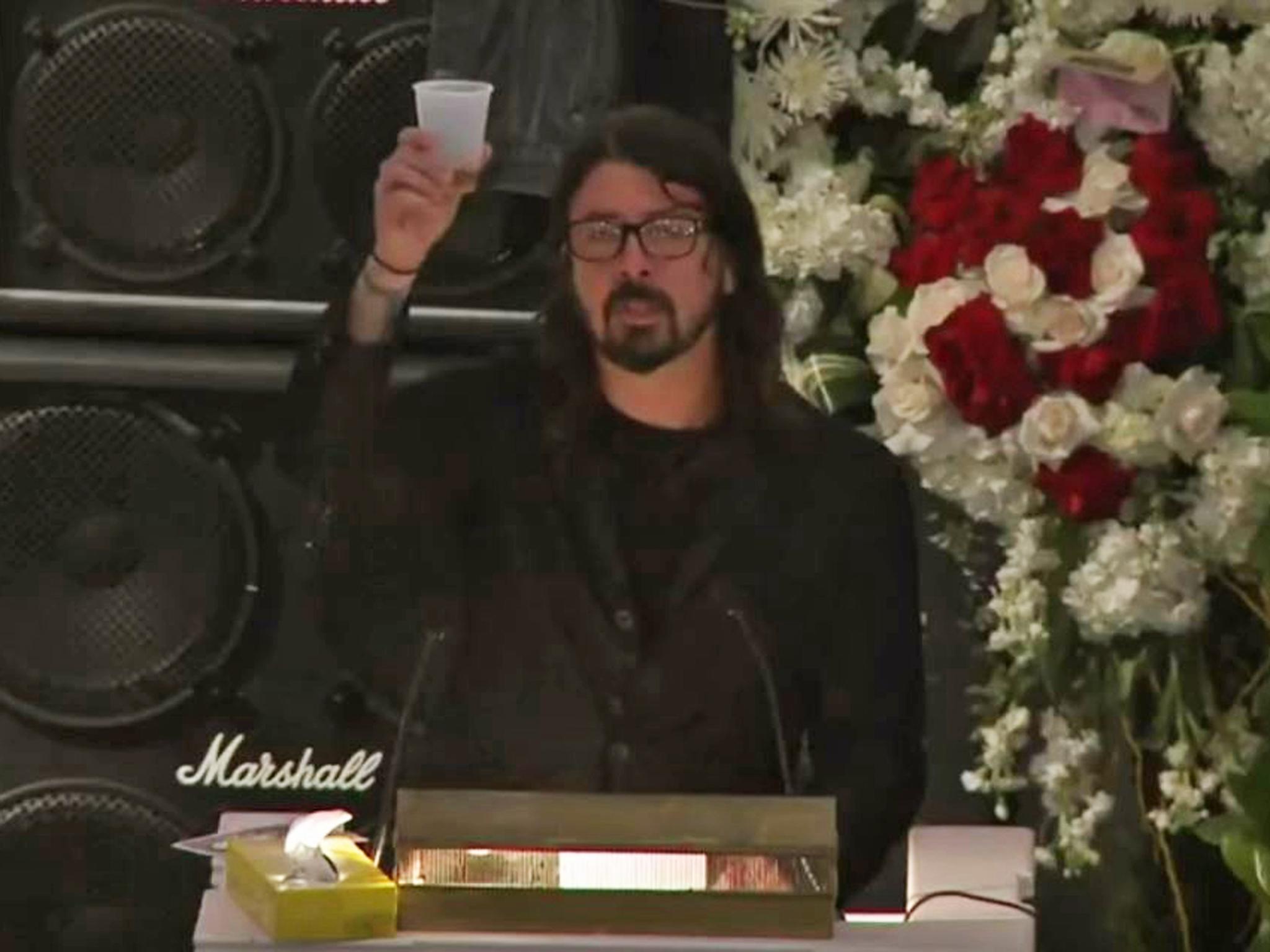 Modern trend: Dave Grohl delivers a speech at Lemmy Kilmister’s televised funeral